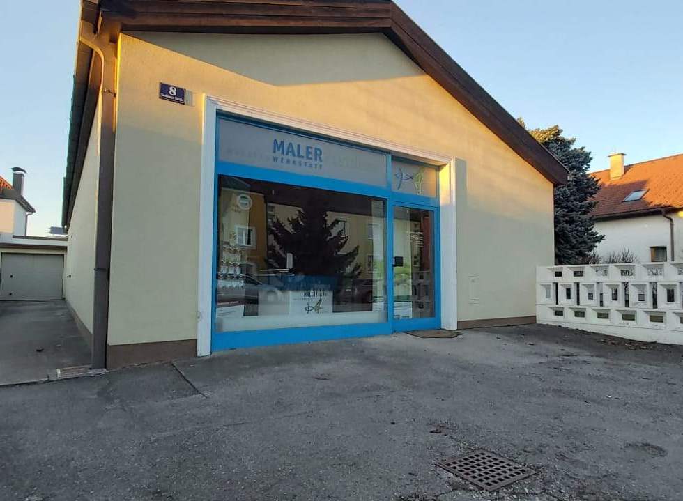 Newly painted house facade in Lower Austria, crisp edges, neat window frames